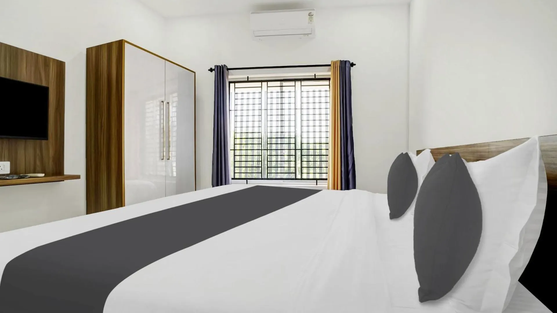 Hotel O Grand Parassini Pappinisseri India