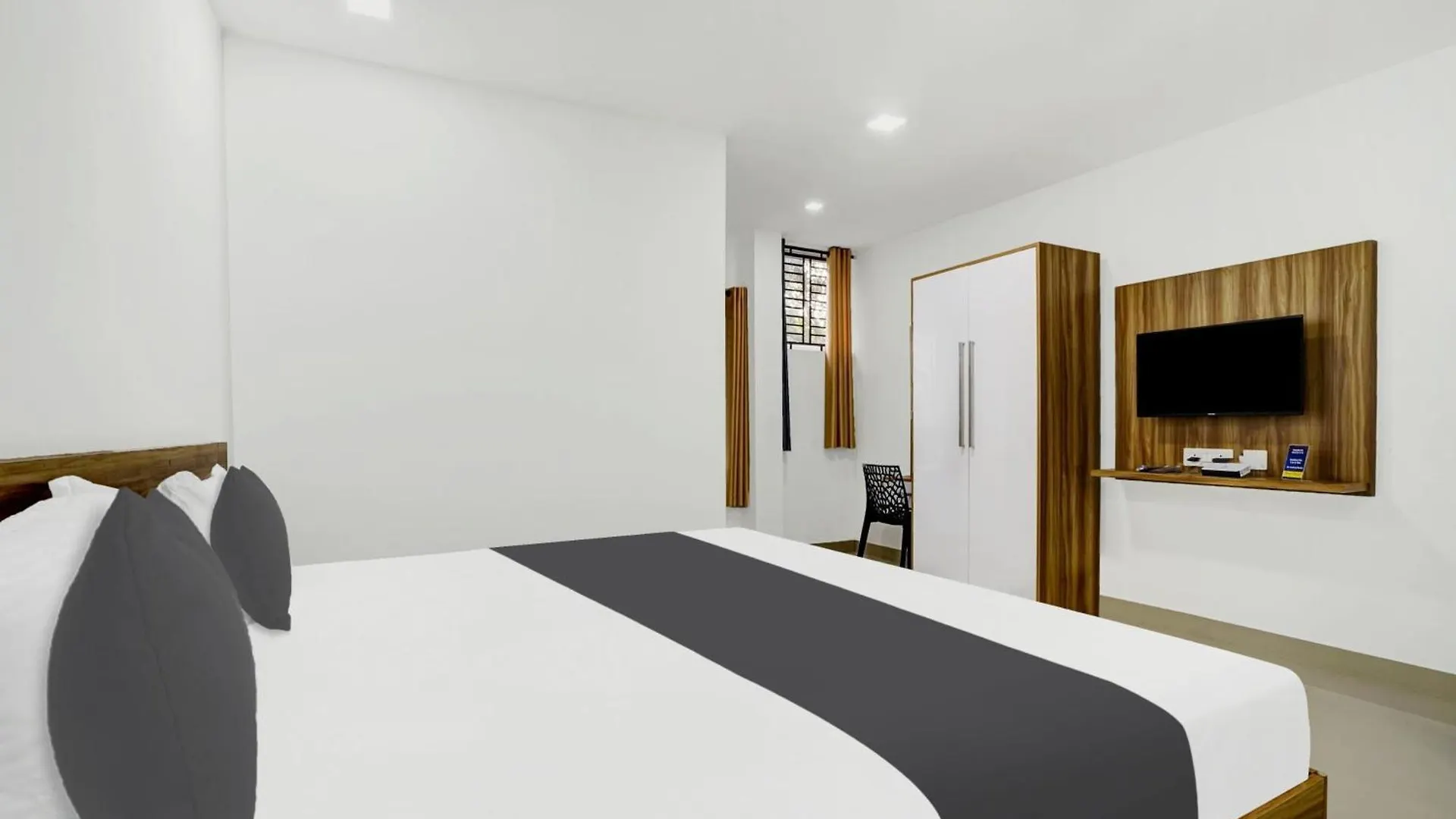 Hotel O Grand Parassini Pappinisseri
